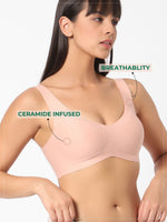 Load image into Gallery viewer, Ceramide Infused Wireless One Size Seamless Beauty Bra in peach color